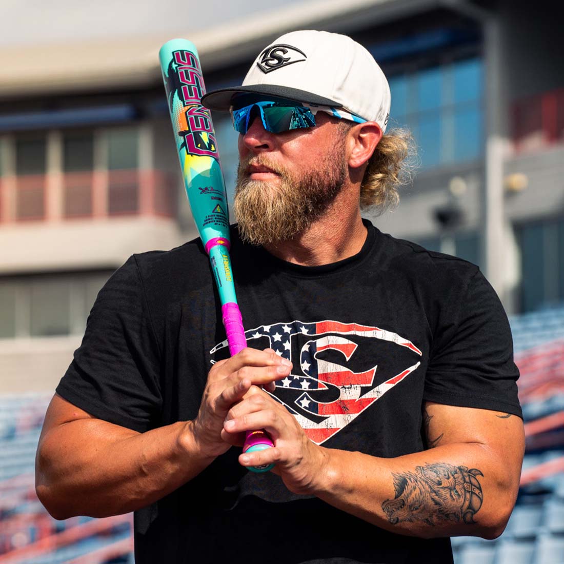 Scott Hartling holding his 2026 Louisville Slugger Genesis Scott Hartling Genesis Slowpitch Bat at the USSSA Stadium