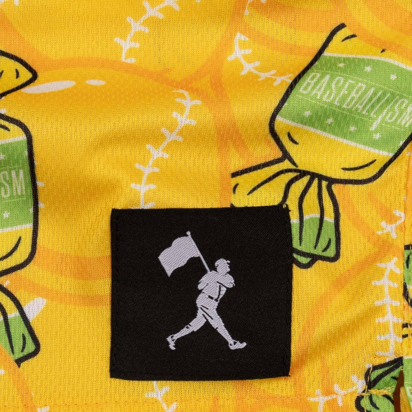 A pair of yellow athletic mesh shorts with a pattern of bubbles and text, and a drawstring waist.