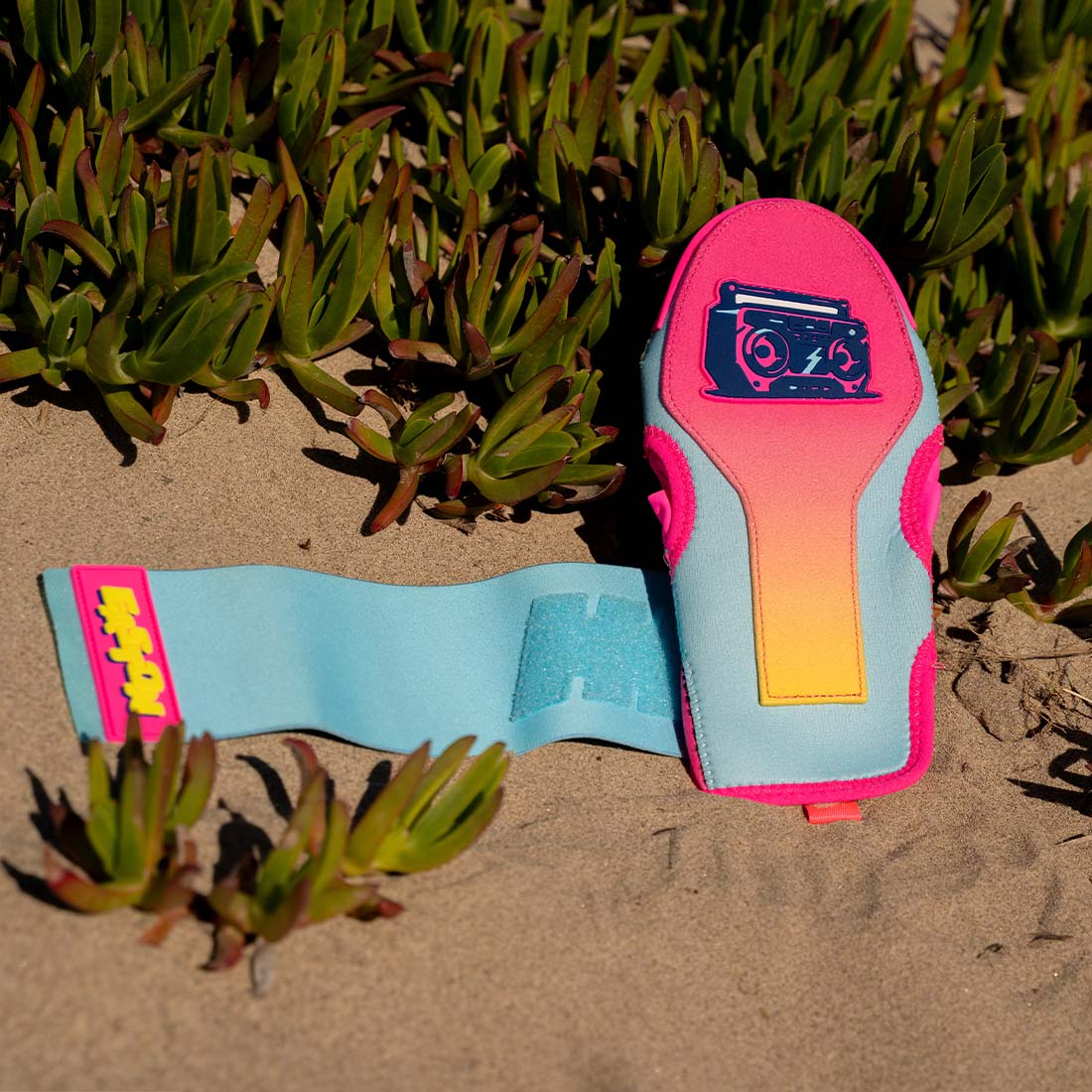 The Boombox Easton Spring Break Collection Sliding Mitt: ESLDMITT on a sandy beach