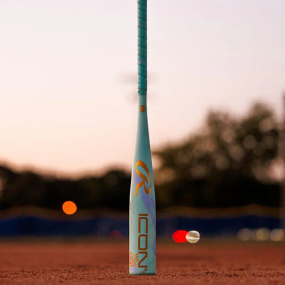 2026 Rawlings Icon The Chosen One -10 USA Baseball Bat: RUS6IONE10 on a baseball field at night
