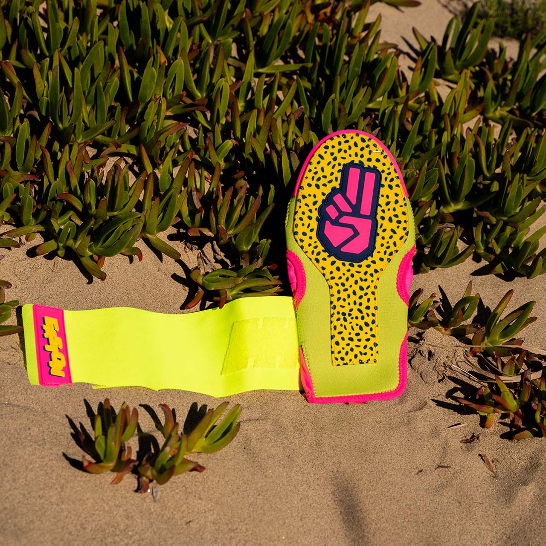 The Dub Easton Spring Break Collection Sliding Mitt: ESLDMITT on a sandy beach