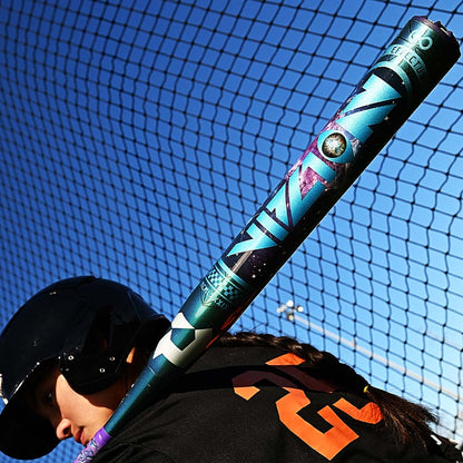 2027 DeMarini Vizion Fastpitch Softball Bat in a batting cage held by a softball player
