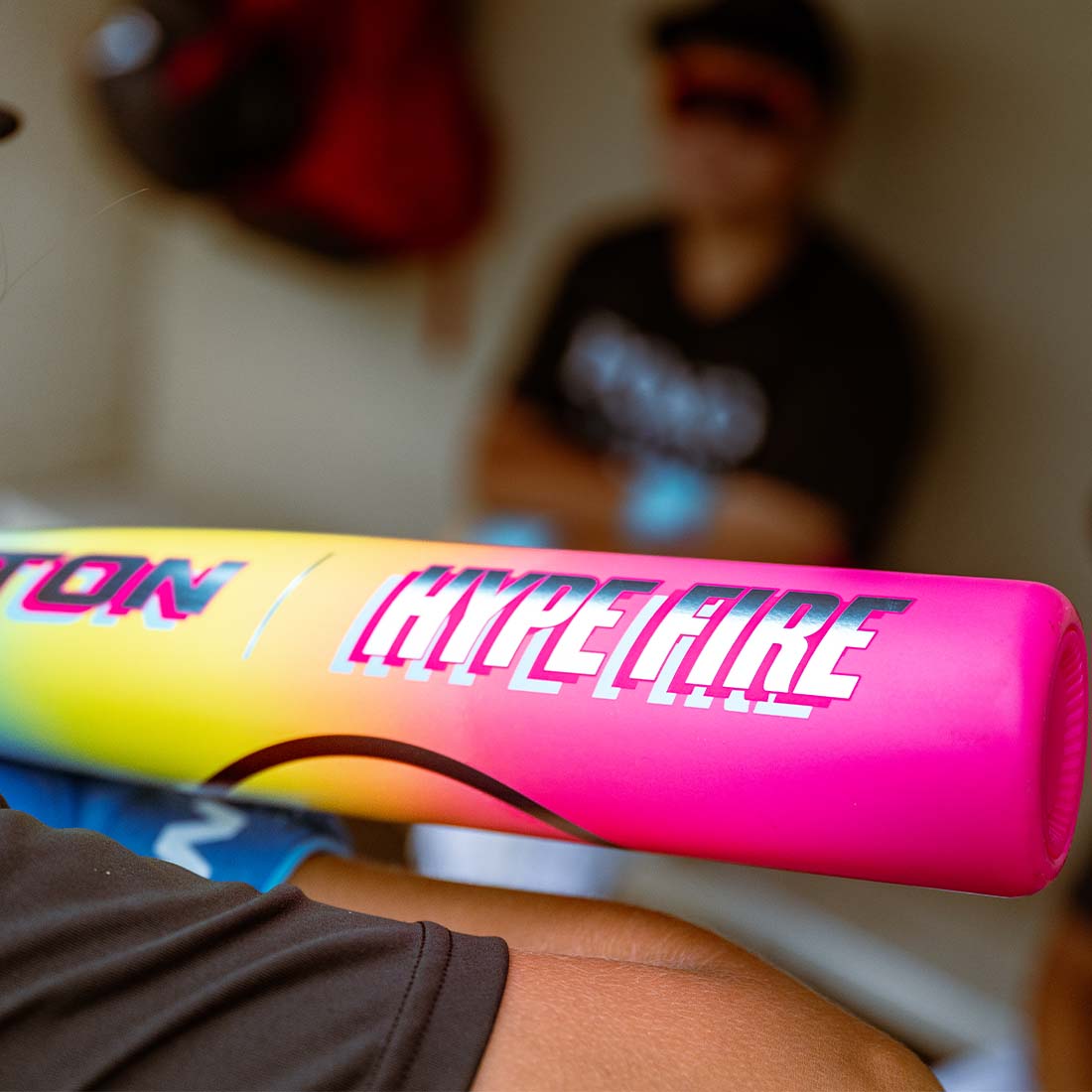 2026 Easton Hype Fire USSSA 2 3/4" Baseball Bat up close in the dugout