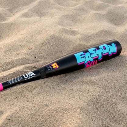 2026 Easton Hype Fire "Spring Break" Black 2 5/8" USA Baseball Bat laying in sand at the beach