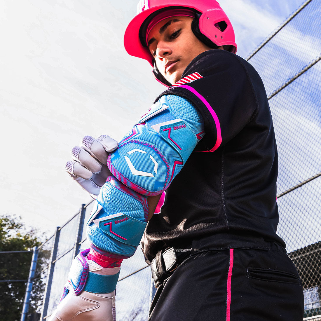 Victory Blue and Pink Evoshield Pro-SRZ 3.0 Batter's Two-Piece Elbow Guard worn by a Perfect Game player