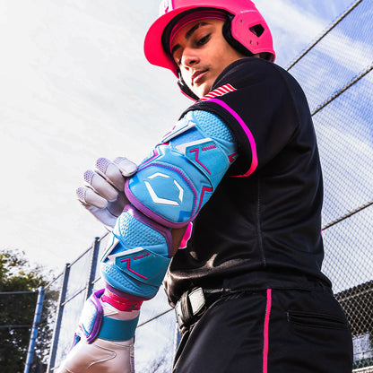 Victory Blue and Pink Evoshield Pro-SRZ 3.0 Batter's Two-Piece Elbow Guard worn by a Perfect Game player