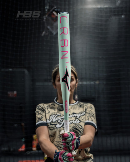 Softball Player holding the new 2026 Mizuno F25 CRBN1 Limited Edition Fastpitch Softball Bat in Mint and Pink at Headbanger Sports