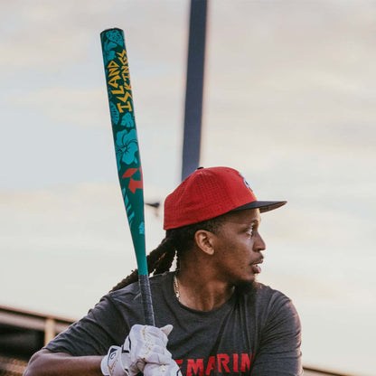 2027 DeMarini Island Kings USSSA slowpitch softball bat with 13 inch endloaded barrel held by a DeMarini Pro Player