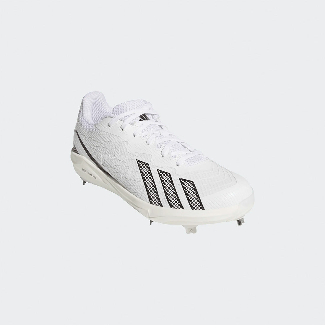 white adidas lightweight baseball cleats with synthetic outsole