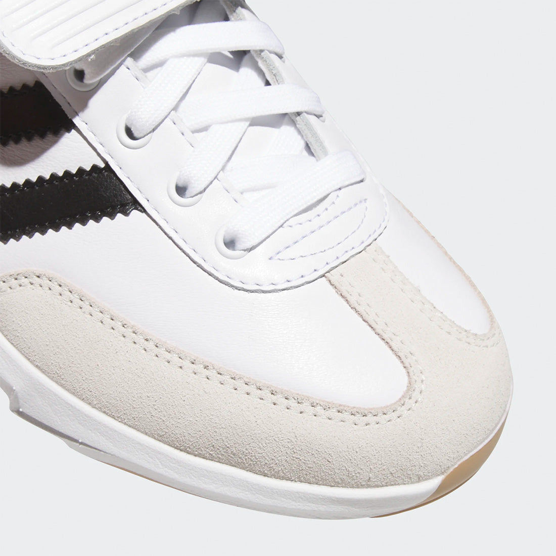 adidas Samba TPU cleats with Lightstrike cushioning
