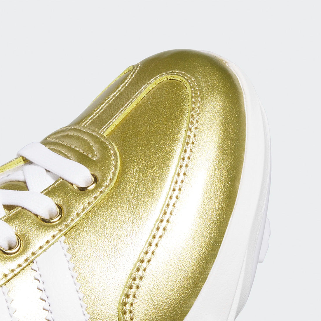 adidas Samba baseball cleats with leather and synthetic upper
