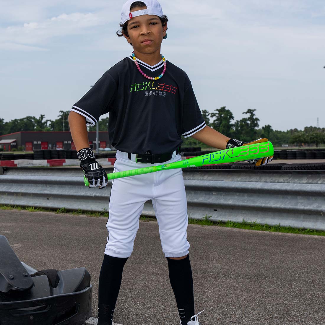 Marucci RCKLESS One PIece USA Baseball Bat being held by a baseball player 