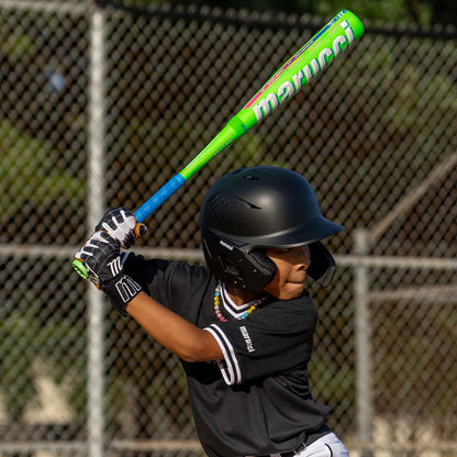 A young baseball player swinging the new Marucci RCKLESS Hybrid USA Baseball Bat