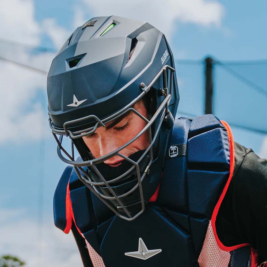 A Baseball Player wearing the All Star MVP-PRO Catcher's Helmets: MVP5 from headbanger sports