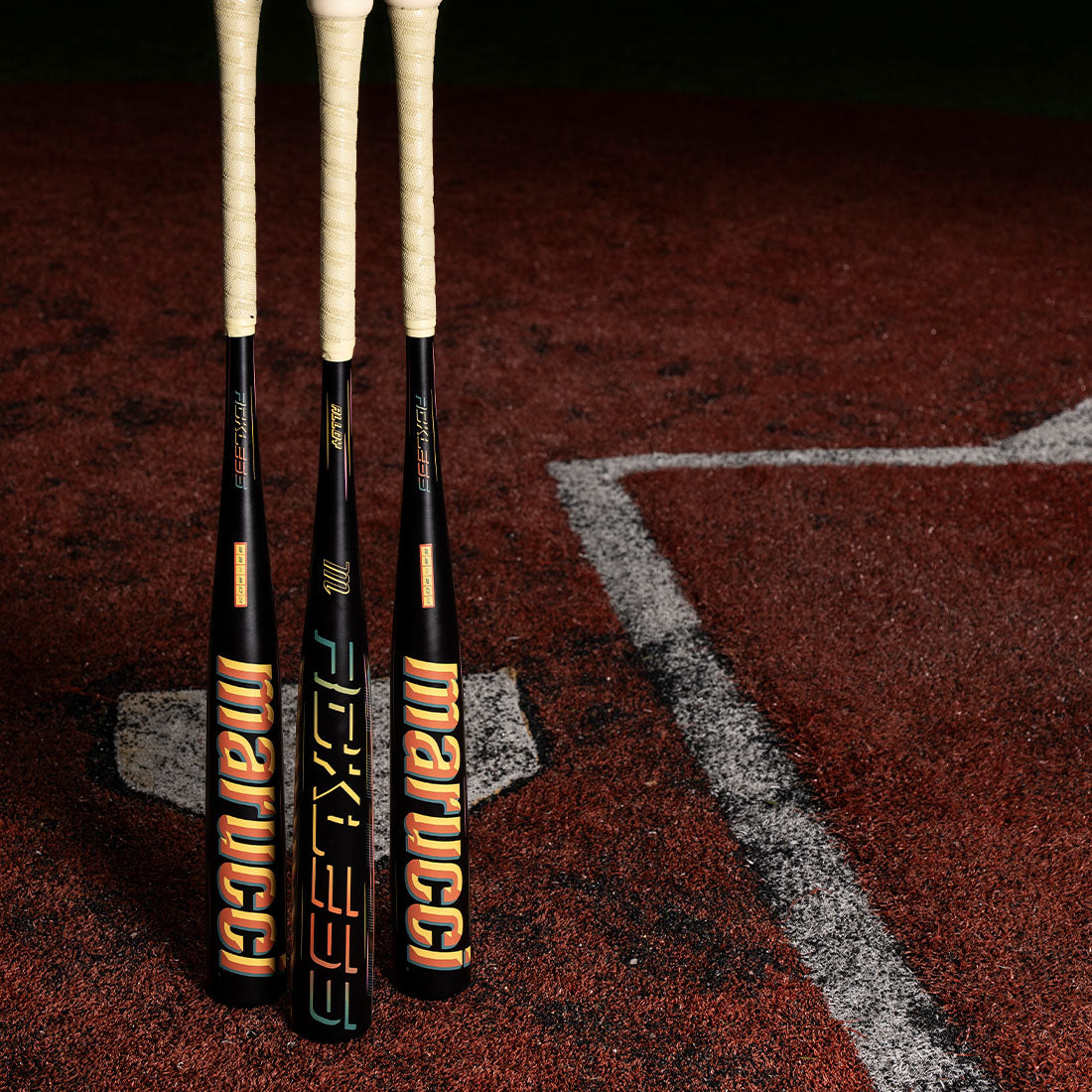 Marucci RCKLESS Gen 2 Alloy BBCOR baseball bat balanced one-piece alloy on a turf baseball field