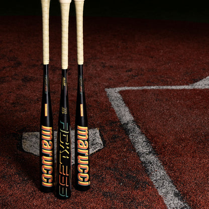 Marucci RCKLESS Gen 2 Alloy BBCOR baseball bat balanced one-piece alloy on a turf baseball field