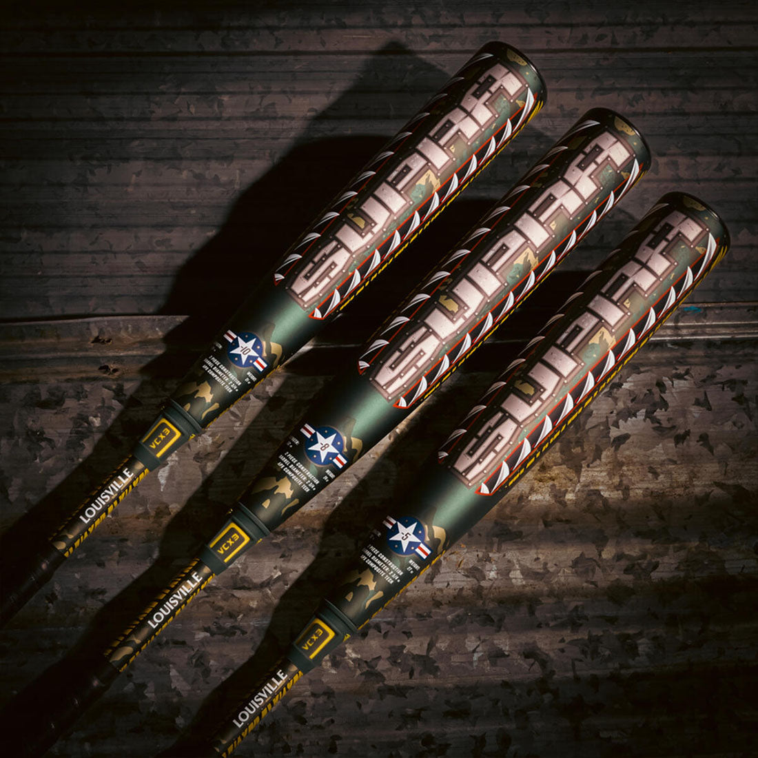 Louisville Slugger SUPRA LE Tigershark USSSA Baseball Bat laying on a camo background