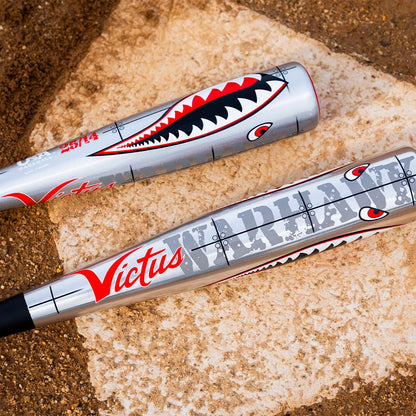 Victus VIBE Warhawk (-3) BBCOR Baseball Bat on home plate in the dirt. Military themed baseball bat