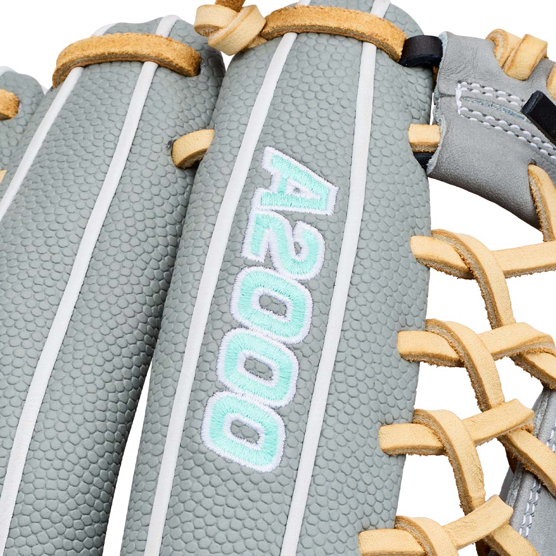 Close-up of a softball glove featuring a textured gray leather palm with white stripes, tan laces, and the model name 'A2000' embroidered vertically in light blue and white.