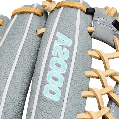 Close-up of a softball glove featuring a textured gray leather palm with white stripes, tan laces, and the model name 'A2000' embroidered vertically in light blue and white.